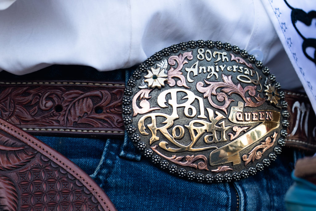 The rodeo queens belt buckle, it reads, eightieth anniversary poly royal rodeo queen.